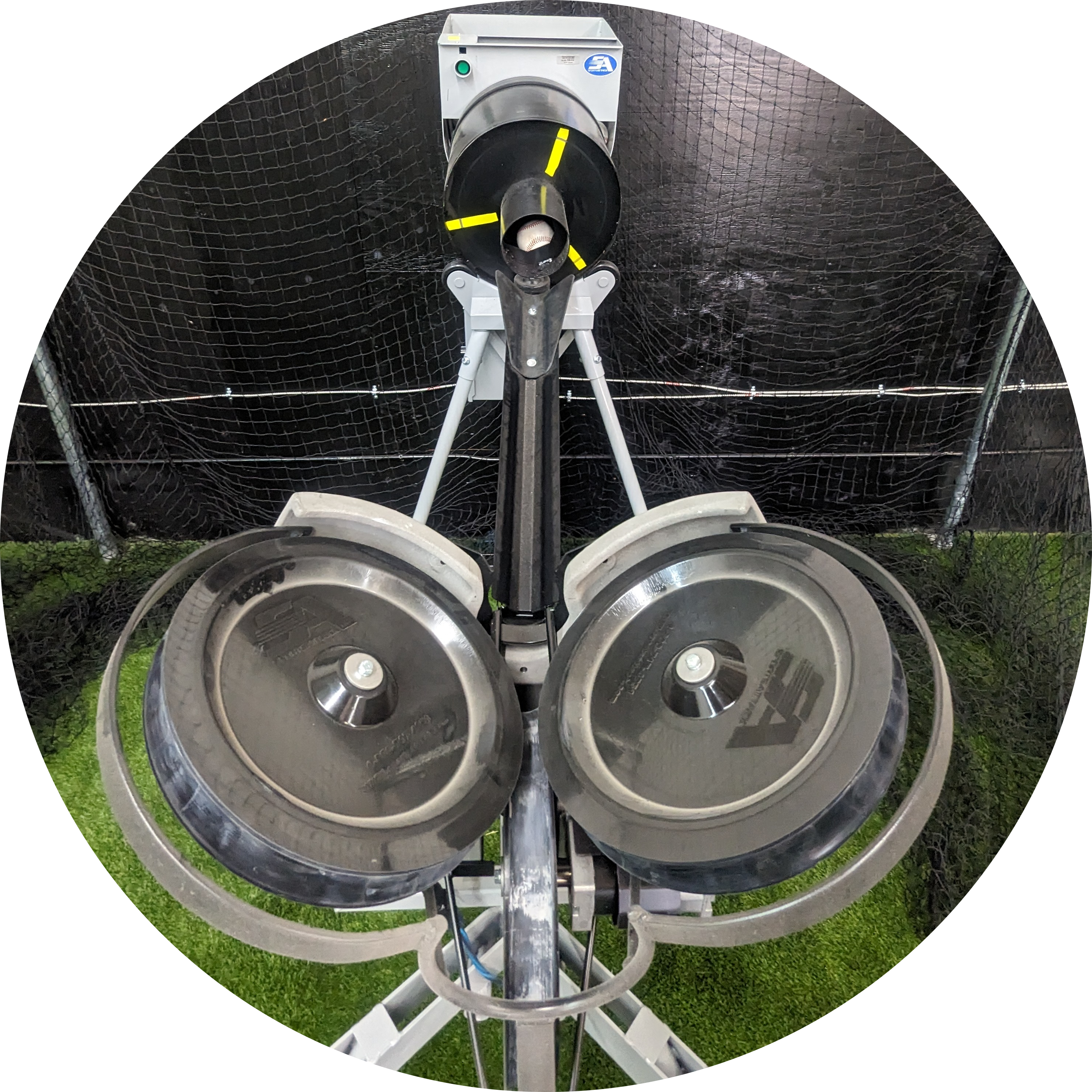 Close-up view of one of the adjustable pitching machines used at the facility.